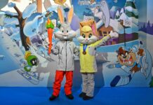 Milano-Cortina – Grande successo all’apertura dell’Official Olympics Pin Trading Center a tema Looney Tunes